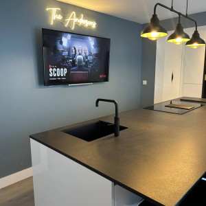 tv in kitchen with lighting